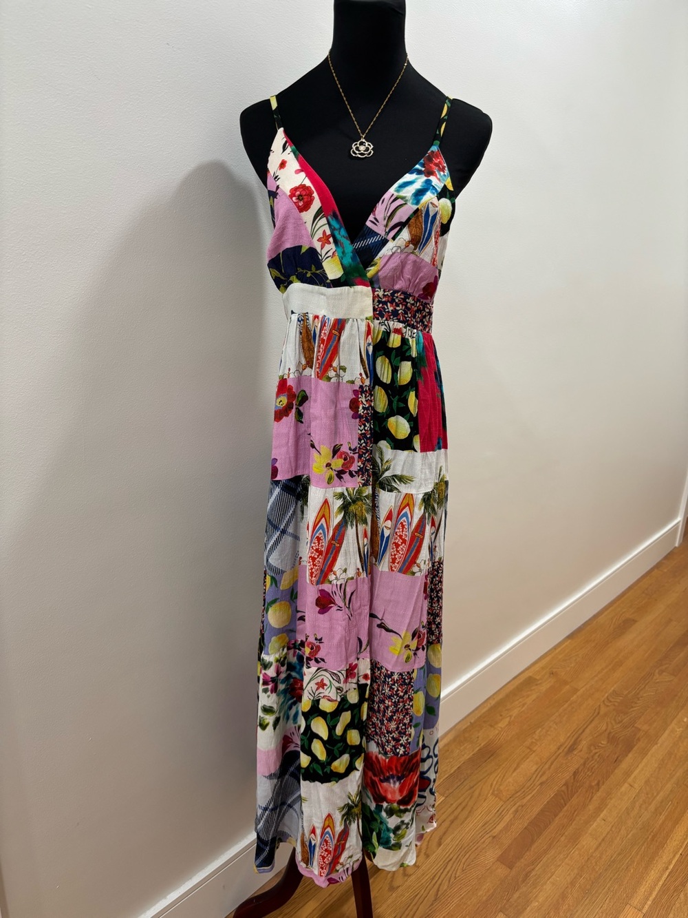 723. Desigual long patch dress featuring a mosaic print of flowers, friezes